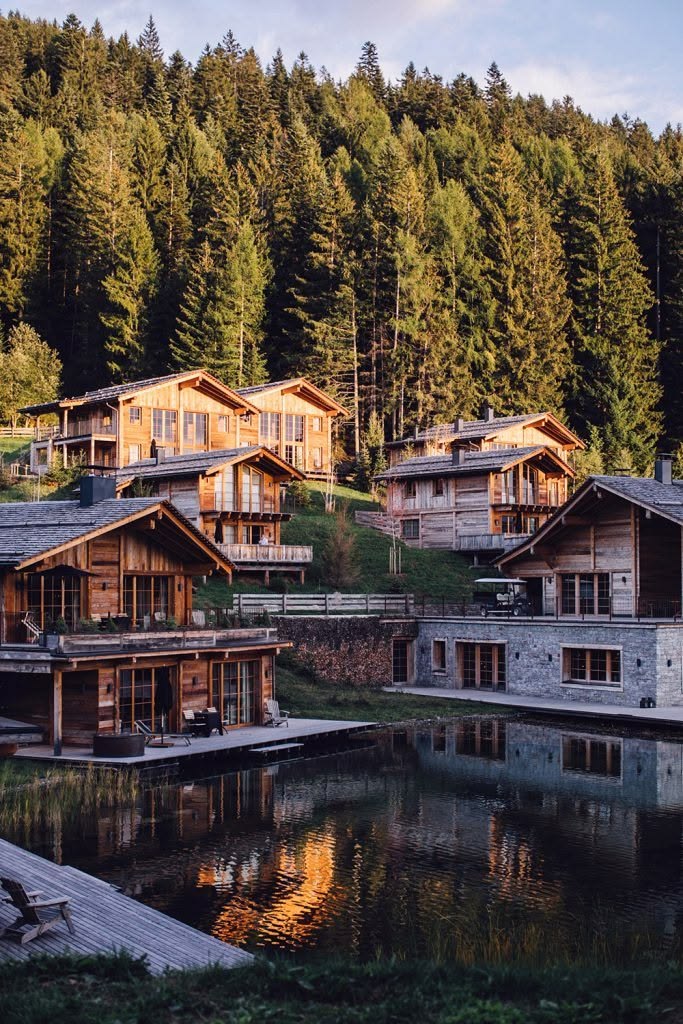 South Tyrol – An Alpine Lake Sanctuary with Private Treehouses & Raw Mountain Luxury